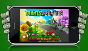 Picture of an iPhone with the Plants v Zombies opening screen...held by a zombie